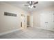 Bright bedroom with a window and carpet, featuring a closet and doorways at 472 Barber Loop, Mooresville, NC 28117