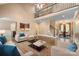 Elegant living room with hardwood floors, a soaring ceiling, and an open concept design at 472 Barber Loop, Mooresville, NC 28117