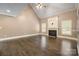 Bright living room with hardwood floors, fireplace, and ample natural light at 472 Barber Loop, Mooresville, NC 28117