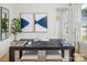 Home office with large desk, natural light, hardwood floors, and stylish decor at 6005 Valehaven Pl # 0049, Charlotte, NC 28269