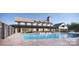 Community clubhouse and pool with plenty of lounge chairs for residents to enjoy at 6005 Valehaven Pl # 0049, Charlotte, NC 28269