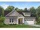 Charming two-story home featuring a welcoming entrance, a two-car garage, and beautifully landscaped front yard at 6005 Valehaven Pl # 0049, Charlotte, NC 28269
