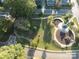 Aerial view of a park with playground, gazebo, and walking paths at 620 Smith St # B, Mooresville, NC 28115