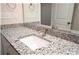 Bathroom vanity with gray cabinets, white countertop, square sink, and modern fixtures at 620 Smith St # B, Mooresville, NC 28115