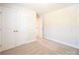 A versatile bedroom showcases wood floors and a convenient double door closet at 620 Smith St # B, Mooresville, NC 28115