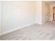 A bright bedroom with neutral carpet and fresh paint offers a cozy retreat at 620 Smith St # B, Mooresville, NC 28115