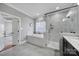 Bright bathroom features a glass enclosed shower and a built-in tub at 726 Amberly Xing, Fort Mill, SC 29708