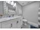 Modern bathroom featuring a marble countertop vanity, updated fixtures, and tile flooring at 726 Amberly Xing, Fort Mill, SC 29708