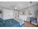 Spacious bedroom features hardwood floors, ceiling fan, and closet with double doors at 726 Amberly Xing, Fort Mill, SC 29708