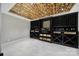 Custom wine cellar featuring a wood ceiling and ample storage at 726 Amberly Xing, Fort Mill, SC 29708