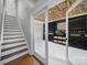 Wine cellar with a custom ceiling viewed from doorway and staircase at 726 Amberly Xing, Fort Mill, SC 29708