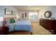 Tastefully decorated bedroom featuring skateboard wall decor and neutral carpet at 7724 Woolsey Dr, Gastonia, NC 28056