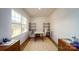 Cozy home office featuring a large window, neutral colors, and two built-in shelves at 7724 Woolsey Dr, Gastonia, NC 28056