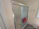 An en-suite bath featuring a glass shower and modern fixtures at 8015 Sullivan Dr # 3 And 2, Charlotte, NC 28215