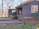 Inviting front entrance with a red door and manicured landscaping at 8015 Sullivan Dr # 3 And 2, Charlotte, NC 28215