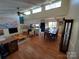 Bright living room with a fireplace and open dining area at 8015 Sullivan Dr # 3 And 2, Charlotte, NC 28215