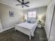 Comfortable bedroom features carpeted floors and a large closet at 1007 Little John Trl, Kannapolis, NC 28081