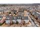 Charming townhome community featuring well-maintained exteriors and tree-lined streets at 11406 Potters Row, Cornelius, NC 28031
