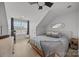 Bright bedroom with bed, dresser and beverage center by the window at 11406 Potters Row, Cornelius, NC 28031