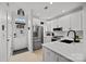 Modern kitchen featuring stainless steel appliances and white cabinetry at 11406 Potters Row, Cornelius, NC 28031