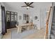 Open and bright office with shelves and natural light at 11406 Potters Row, Cornelius, NC 28031