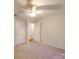 Bedroom with carpet, ceiling fan, and a white door to the hallway at 1200 Berkshire Dr, Kannapolis, NC 28081