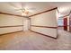 Bedroom with neutral carpet and dark wood trim at 1200 Berkshire Dr, Kannapolis, NC 28081