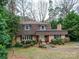 Charming brick home with a well-manicured lawn and mature landscaping at 1200 Berkshire Dr, Kannapolis, NC 28081