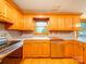 Bright kitchen with ample cabinet space, stainless steel appliances, and tile flooring at 1200 Berkshire Dr, Kannapolis, NC 28081