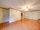 Expansive living room with hardwood floors and easy access to other rooms at 1200 Berkshire Dr, Kannapolis, NC 28081