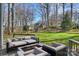 A beautiful backyard with a fire pit and outdoor seating area at 12724 Cliffcreek Dr, Huntersville, NC 28078