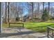 A sprawling backyard with lush green grass and mature trees at 12724 Cliffcreek Dr, Huntersville, NC 28078