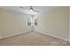 Bright bedroom with neutral paint, carpet, and natural light at 12724 Cliffcreek Dr, Huntersville, NC 28078