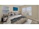 Bedroom featuring neutral paint, carpet, natural light, and stylish furnishings at 12724 Cliffcreek Dr, Huntersville, NC 28078