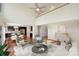 Spacious living room with vaulted ceilings, wood floors, and a view into the kitchen at 12724 Cliffcreek Dr, Huntersville, NC 28078