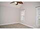 Spacious bedroom featuring a vaulted ceiling, neutral paint, carpet, and bright windows at 13840 Hastings Farm Rd, Huntersville, NC 28078