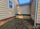 View of home's exterior with window at 1637 Longfellow St, Charlotte, NC 28205