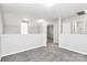 Well-lit loft area with ample space, neutral walls, and easy access to other rooms at 1765 Holliford Ct, Charlotte, NC 28215