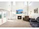 Bright living room with a fireplace, tall ceilings, and plenty of natural light at 184 Settlers Grove Ln # L7, Salisbury, NC 28146