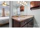 Bathroom with a double sink vanity and a modern lighting fixture at 1921 Kenilworth Ave, Charlotte, NC 28203