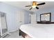 Bedroom featuring neutral walls, a standing mirror, and a ceiling fan at 1921 Kenilworth Ave, Charlotte, NC 28203