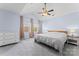 Spacious bedroom featuring a ceiling fan, neutral walls, and natural lighting at 1921 Kenilworth Ave, Charlotte, NC 28203