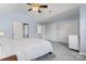 Bright primary bedroom with a ceiling fan and ample closet space at 1921 Kenilworth Ave, Charlotte, NC 28203