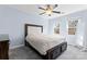 Bedroom featuring a ceiling fan, natural lighting, and a modern bed frame at 1921 Kenilworth Ave, Charlotte, NC 28203