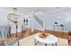 Spacious open-concept living area with seamless flow to dining and stairs at 1921 Kenilworth Ave, Charlotte, NC 28203