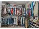 Organized walk-in closet featuring ample storage space for clothing and accessories at 2112 Eastway Dr, Dallas, NC 28034