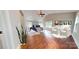Spacious bedroom features wood floors, vaulted ceilings, neutral paint, and a cozy seating area at 2721 Dora Dr, Charlotte, NC 28215