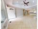 Open-concept living room featuring tile flooring and plenty of natural light at 2721 Dora Dr, Charlotte, NC 28215