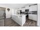 Bright kitchen featuring stainless steel appliances, a large island, and modern white cabinetry at 2754 Legacy Ridge Ln, Catawba, NC 28609