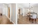 Inviting entryway featuring hardwood floors, staircase, and views into the dining and living spaces at 2927 Forest Hills Cir, Rock Hill, SC 29732